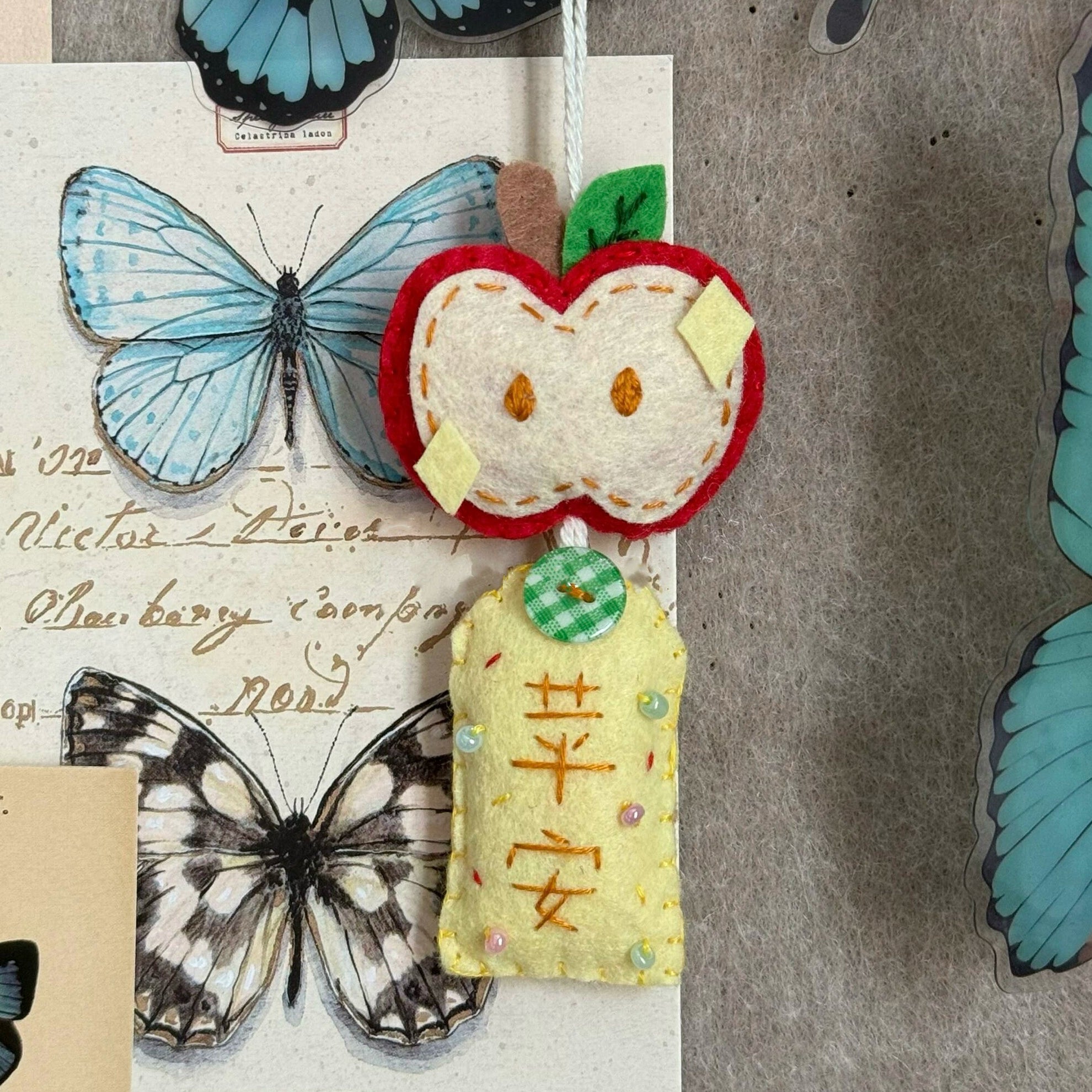 apple 'peace and safety' pendant keychain