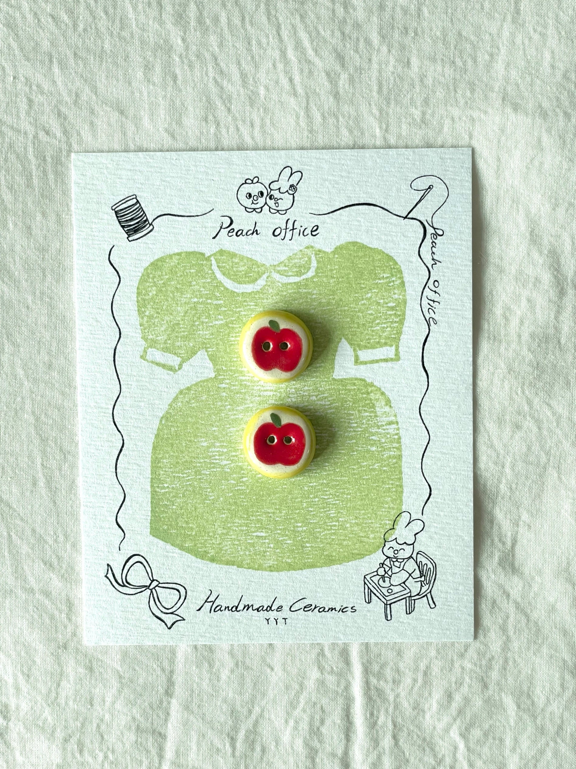 red apple buttons