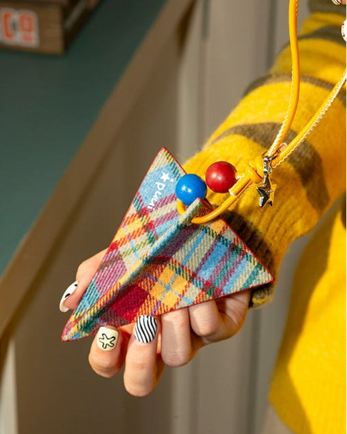 paper airplane pendant