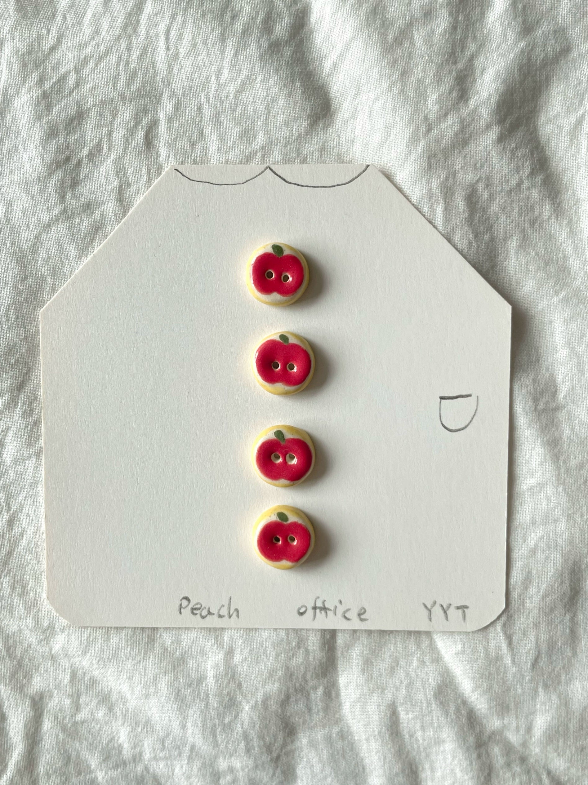 red apple buttons
