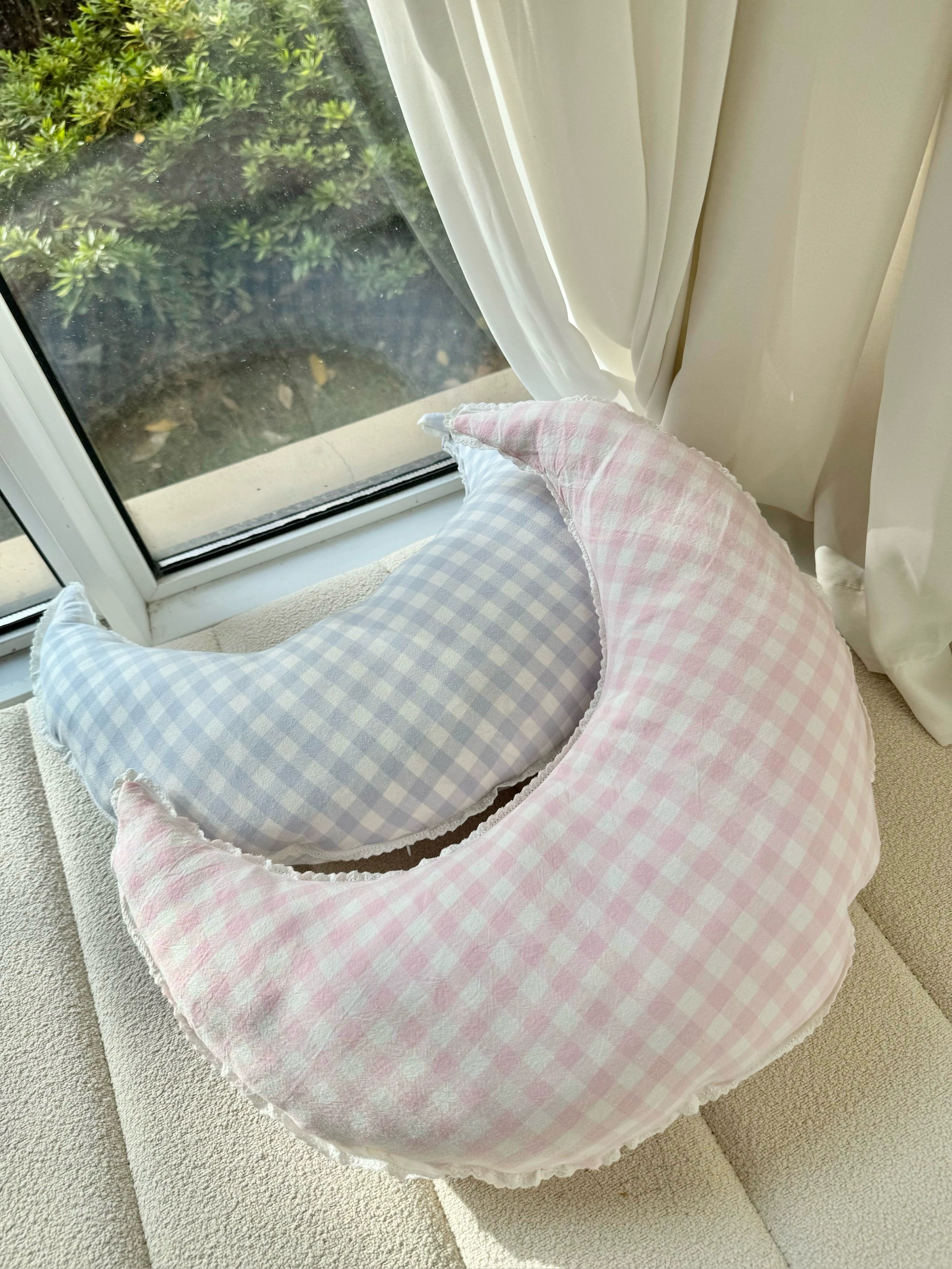 checked crescent moon pillow