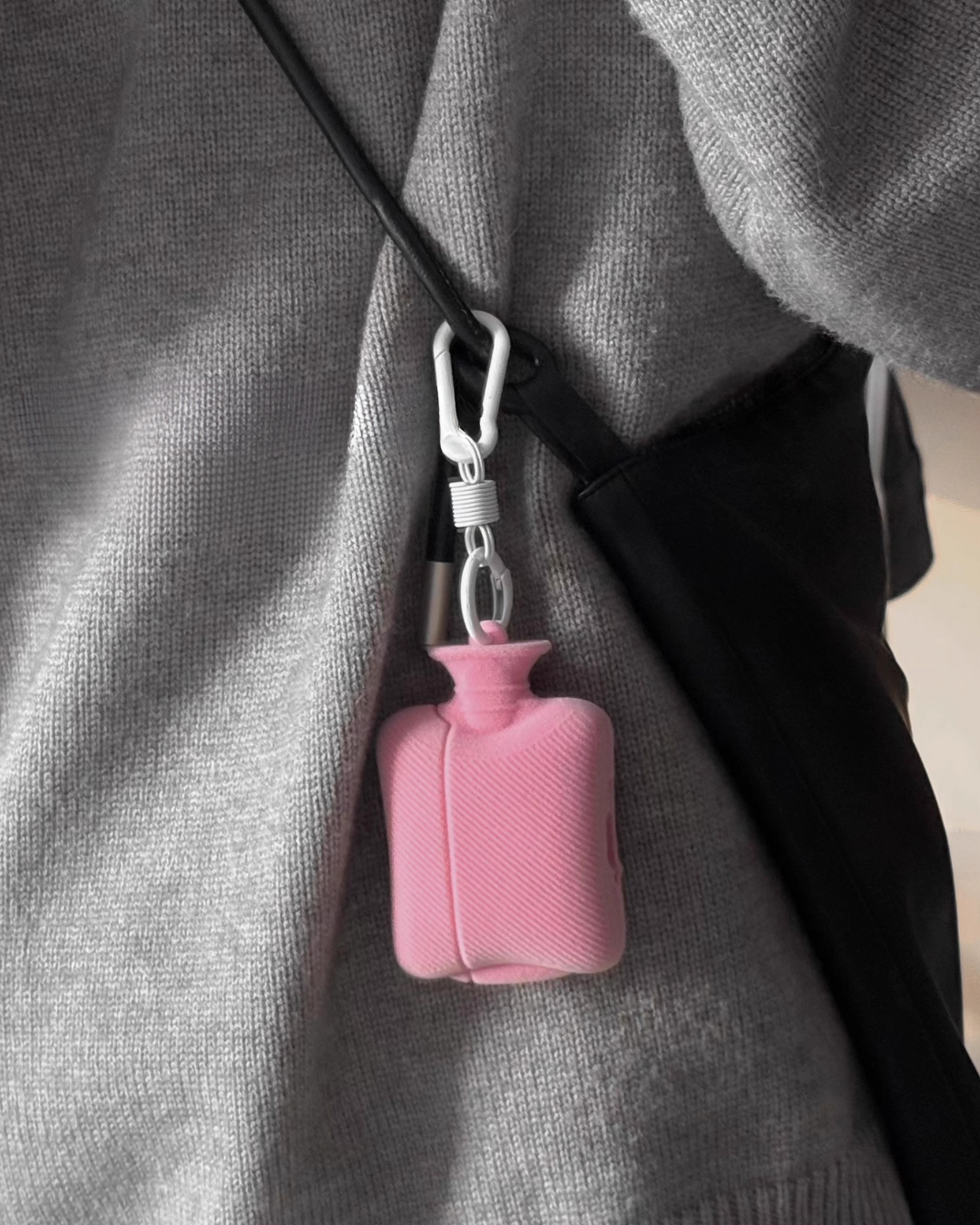 pink hot water bottle airpods case