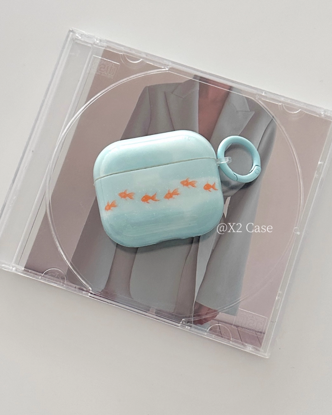 swim goldfish airpods case