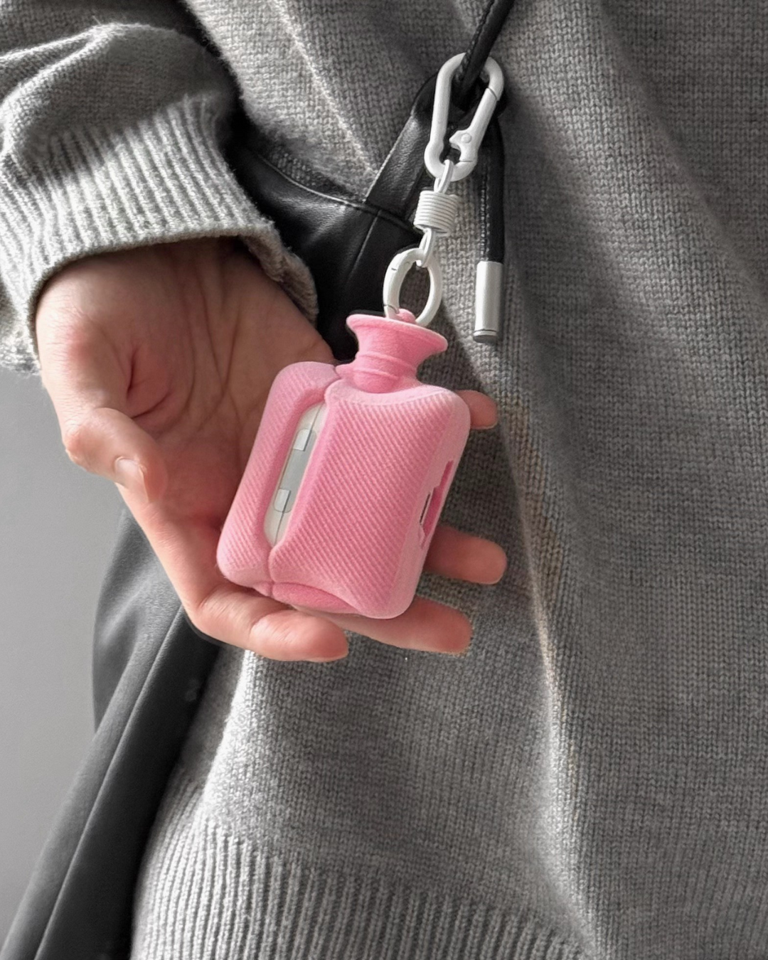 pink hot water bottle airpods case