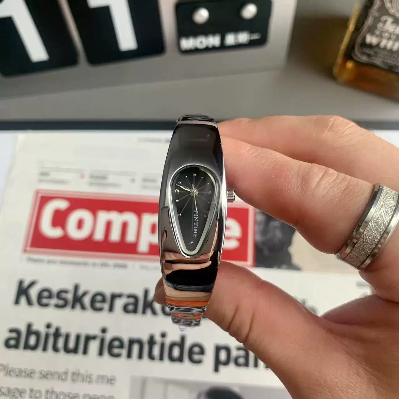 teardrop analog watch