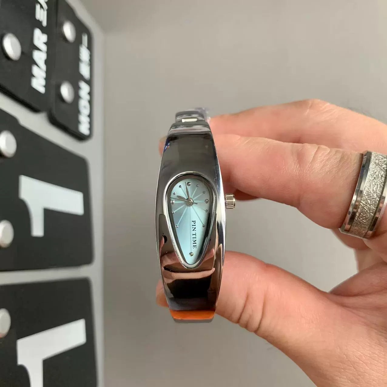 teardrop analog watch