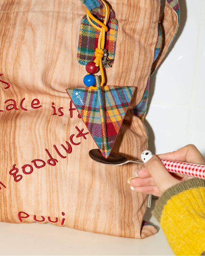 paper airplane pendant