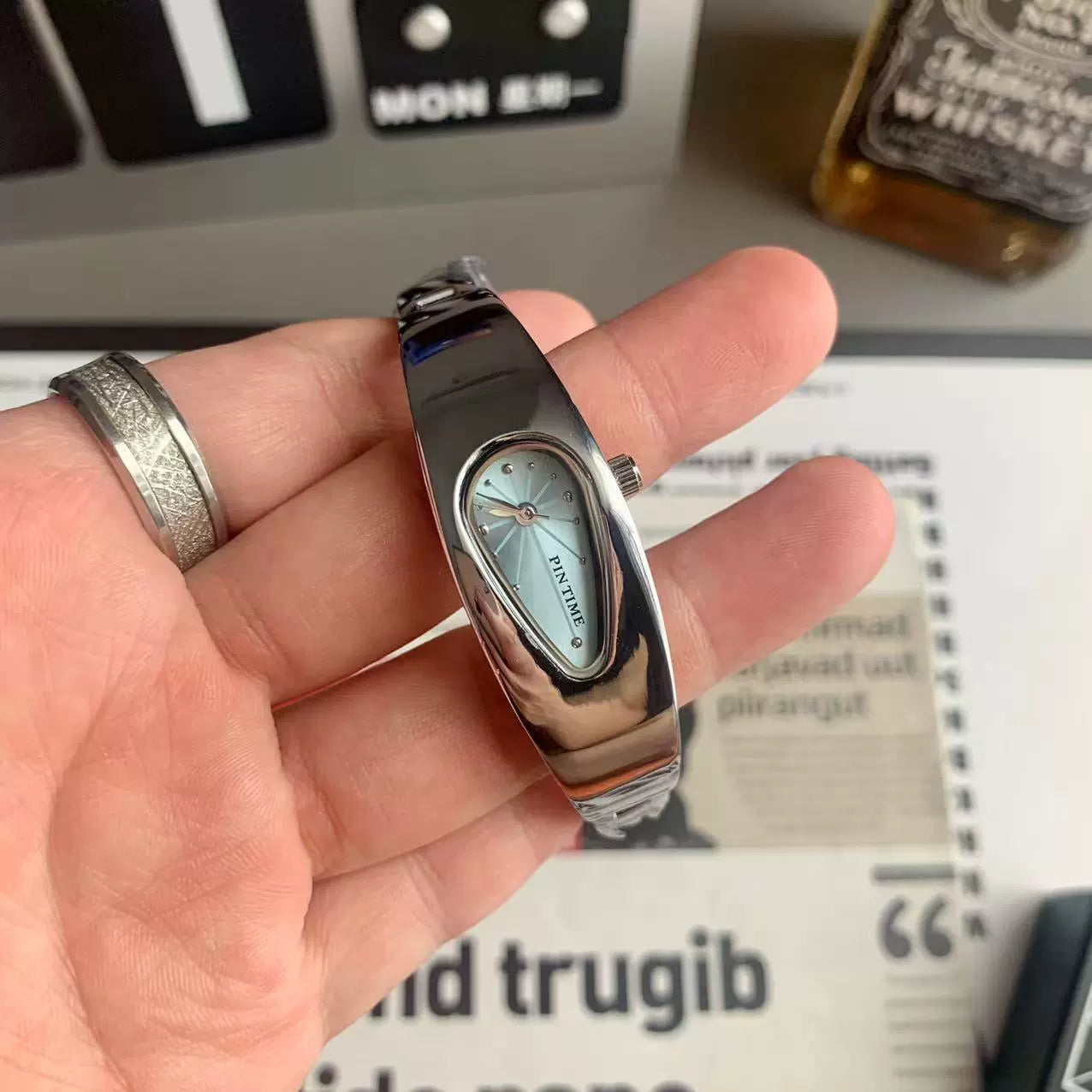 teardrop analog watch