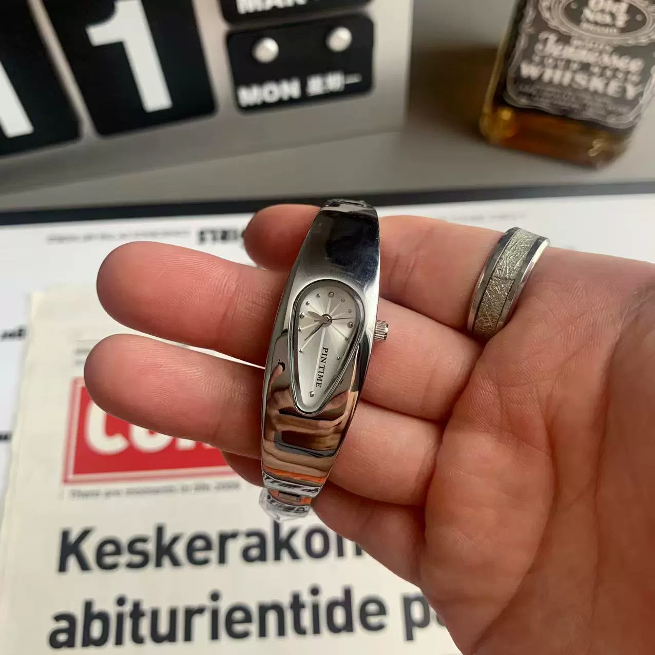 teardrop analog watch