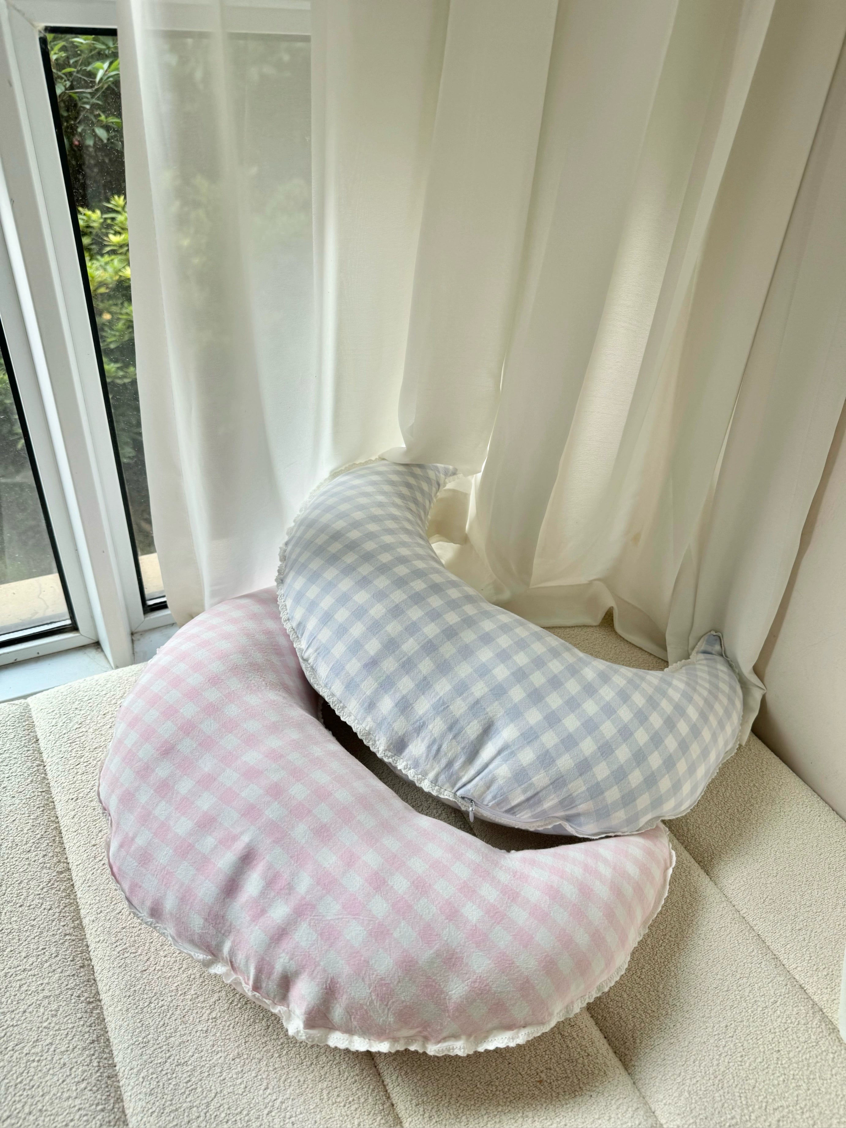 checked crescent moon pillow