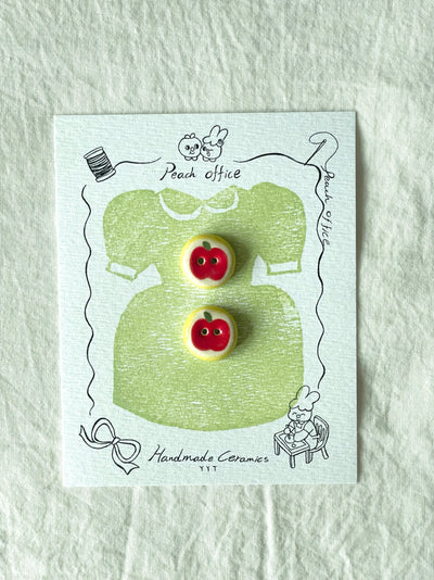 red apple buttons
