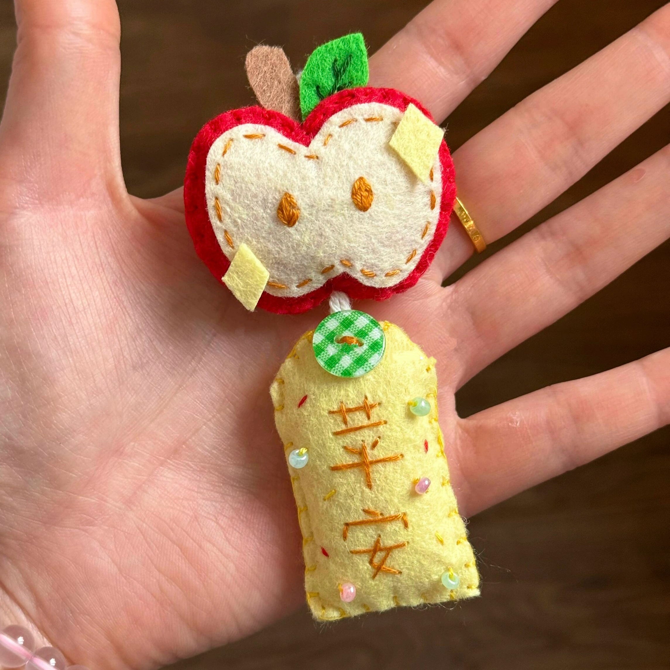 apple 'peace and safety' pendant keychain