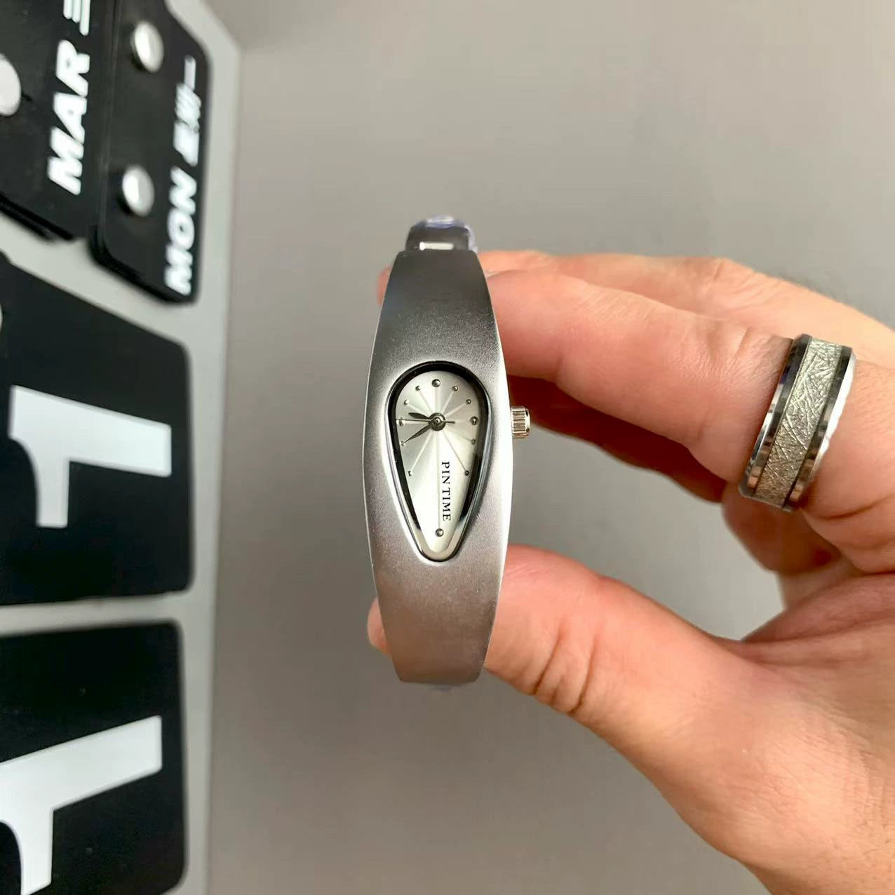 teardrop analog watch