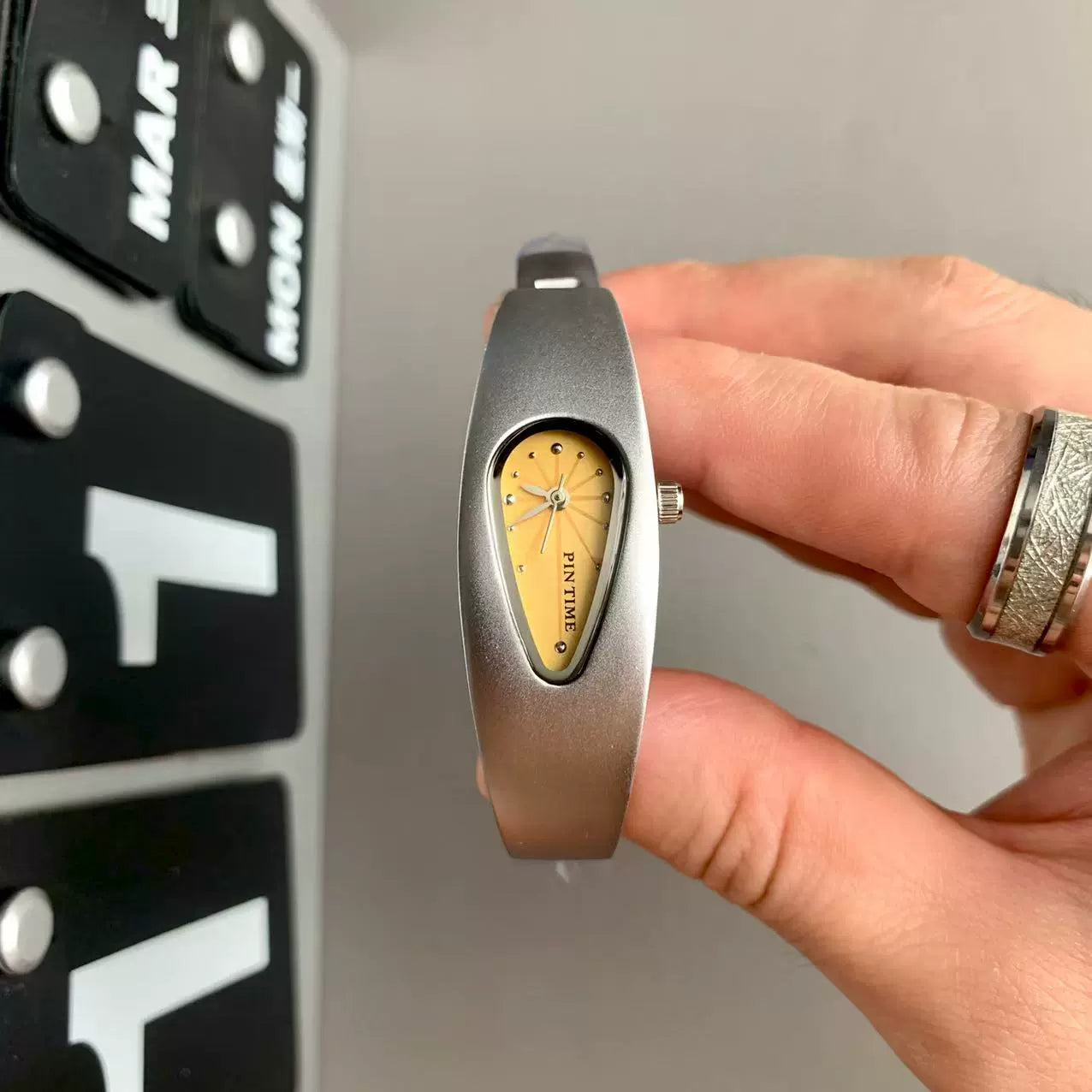 teardrop analog watch