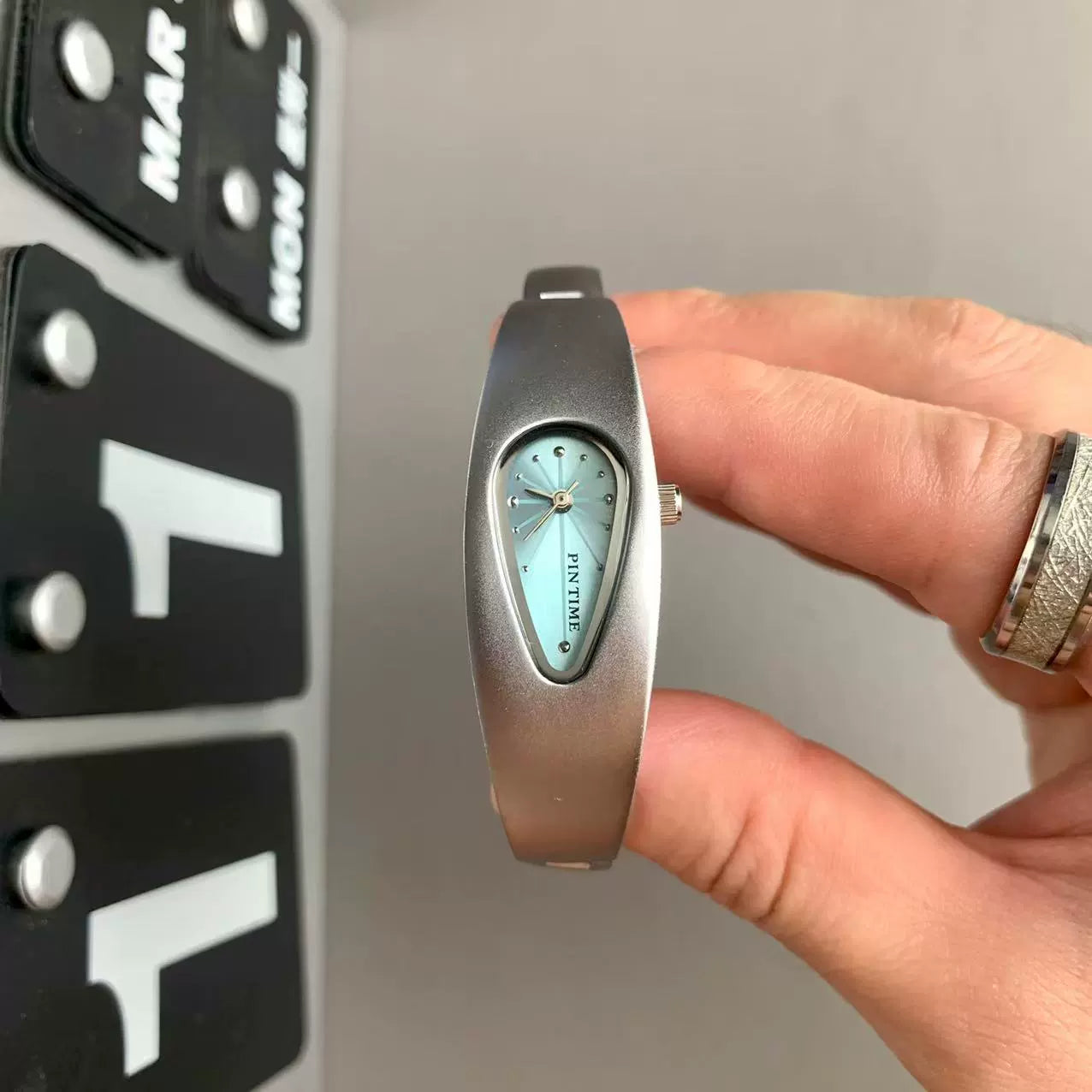 teardrop analog watch