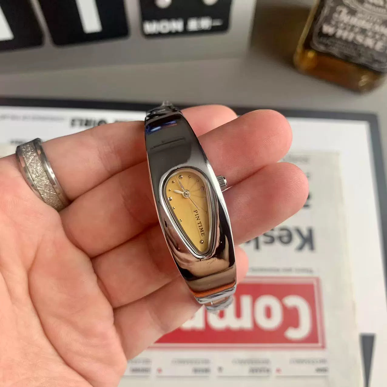 teardrop analog watch